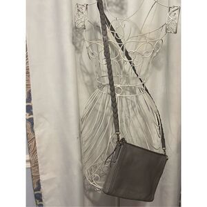 Authentic Fossil genuine leather crossbody bag with braided detail on adjustable
